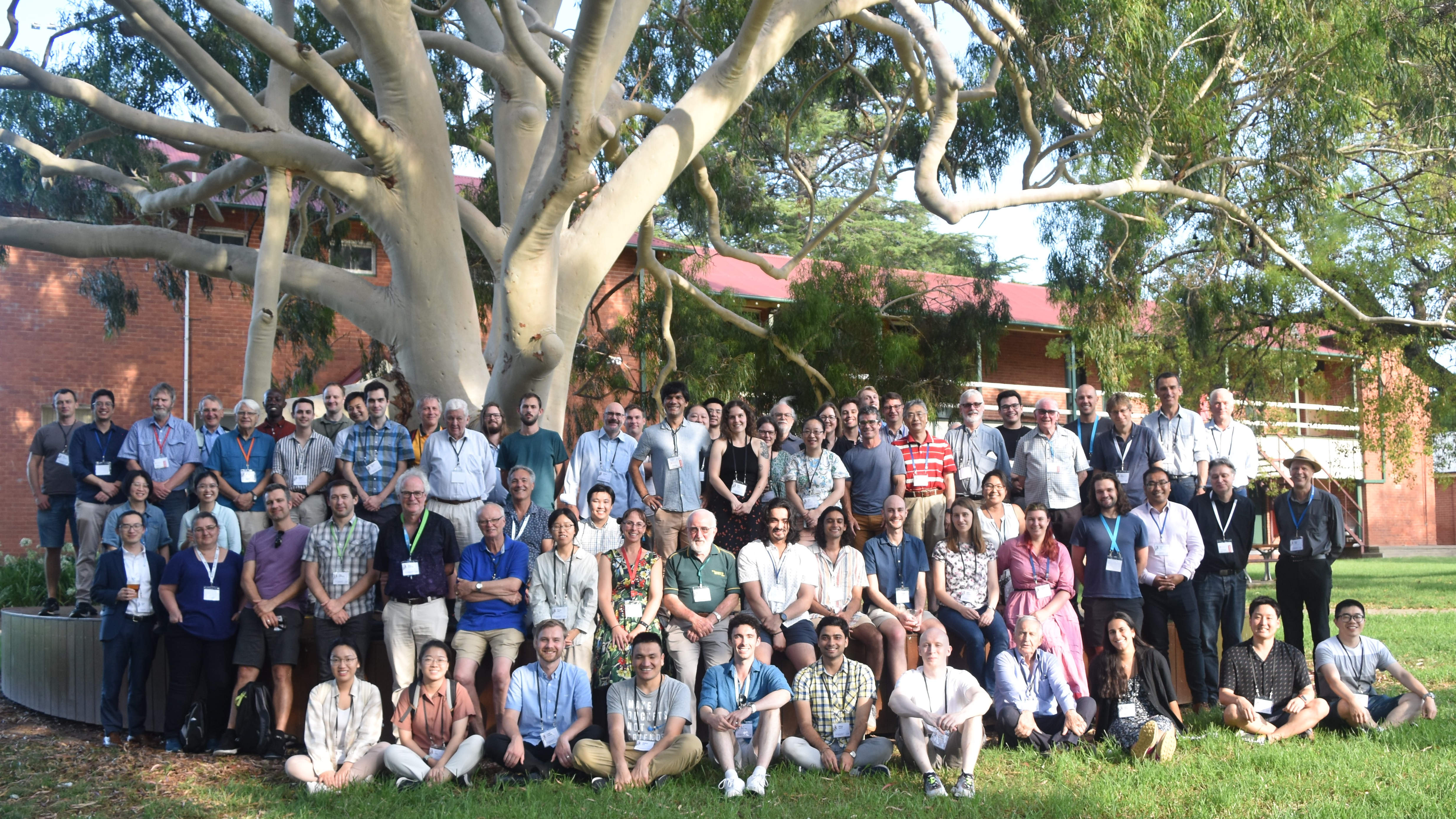 Wagga2023 delegates under the "old gum tree" at Charles Sturt University, Wagga Wagga Australia